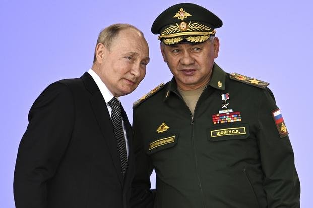 Russia's President Vladimir Putin and Russian Defense Minister Sergei Shoigu