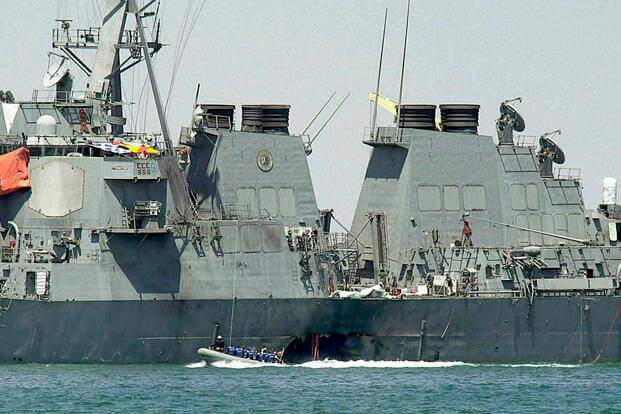 Damaged hull of the USS Cole at the Yemeni port of Aden.
