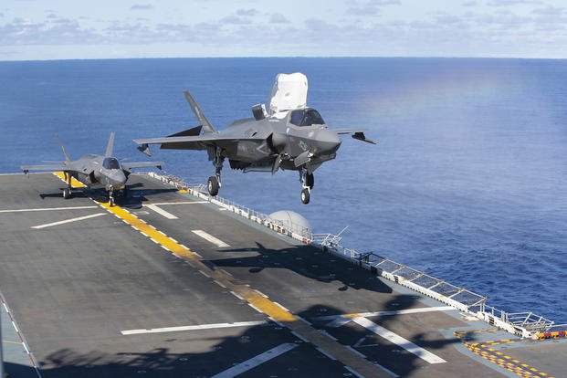 An F-35B Lightning II takes off from the USS Tripoli.