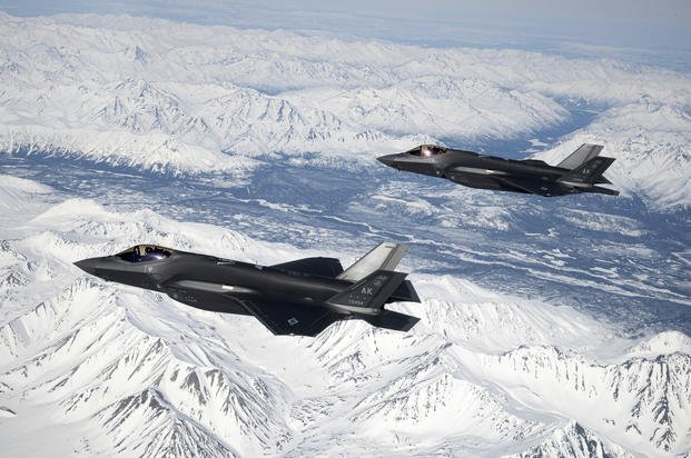 two Air Force F-35A Lighting IIs fly over the Joint Pacific Alaska Range Complex.