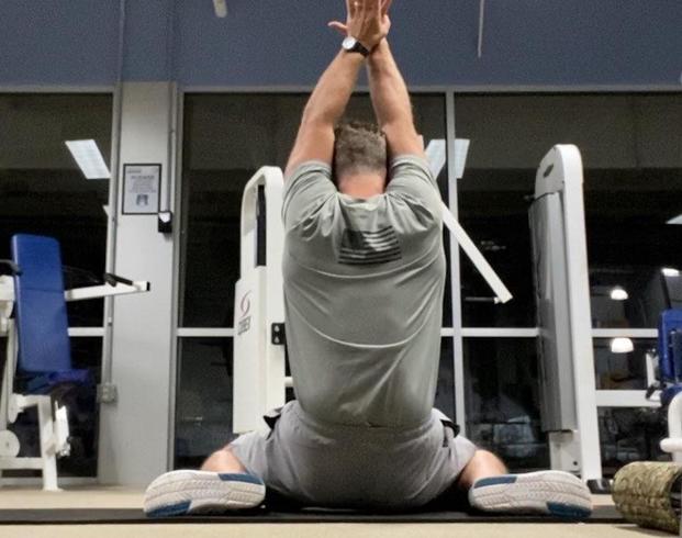 stew smith sitting frog pose