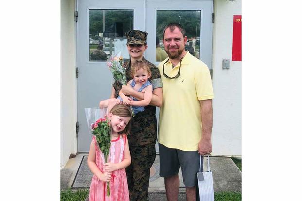 Danielle Falcon, her husband Chris, and daughters Emma and Graycie.