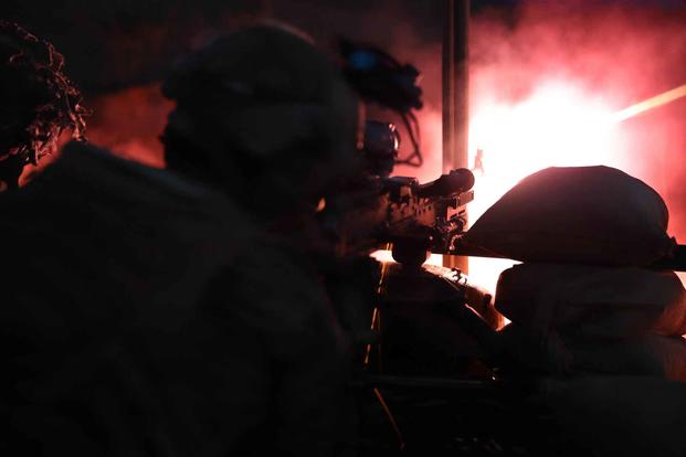A Marine fires an M240B during a field exercise at Camp Pendleton.