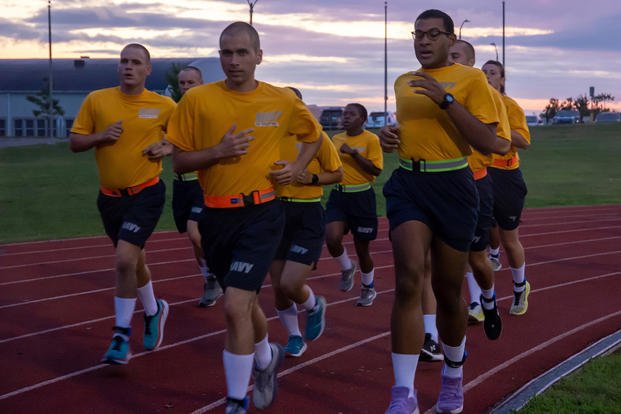 Officer Candidate School (OCS) class 16-21 students, at Officer Training Command Newport (OTCN), Rhode Island, perform a 1.5-mile run as part of a physical fitness assessment.
