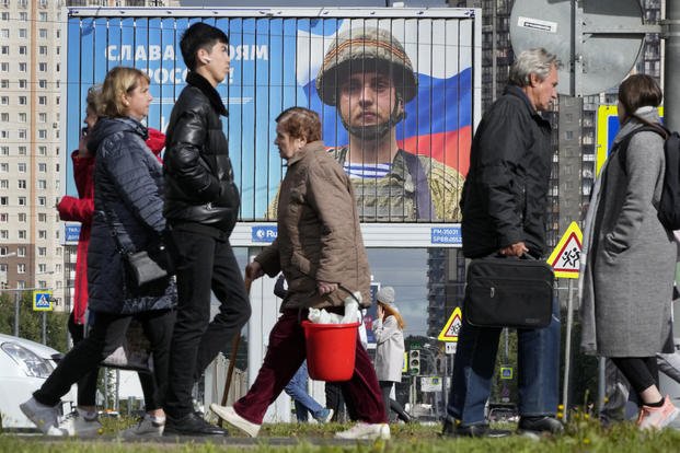 Billboard with a portrait of a Russian soldier in St. Petersburg, Russia.