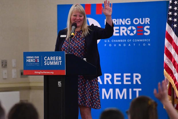 Crystal Kearns, Hiring Our Heroes director for hiring events, talks about achieving economic success during an HOH career summit at Joint Base Charleston, South Carolina.
