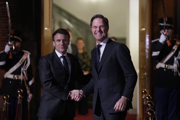 Macron and Dutch Prime Minister Mark Rutte.