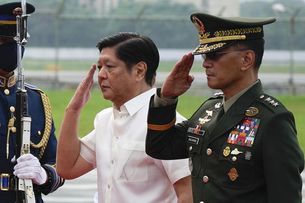Philippine President Ferdinand Marcos Jr. and Philippine military chief Lt. Gen. Bartolome Vicente Bacarro