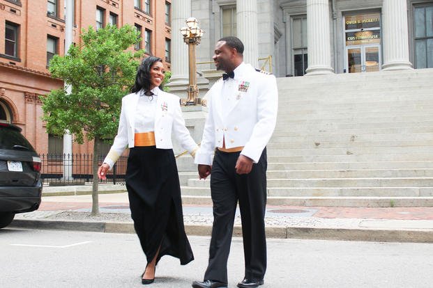 Capts. Kimberly Jones and Ray Glenn pose for a wedding photo outside the Owen B. Pickett U.S. Custom House