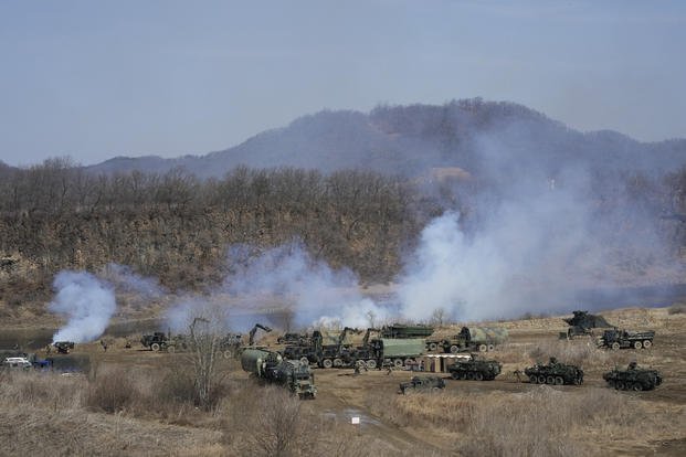 U.S. Army's armored vehicles prepare to cross the Hantan river at a training field in Yeoncheon
