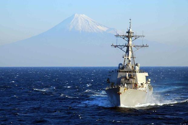 The USS Curtis Wilbur with Mt. Fuji in the background.