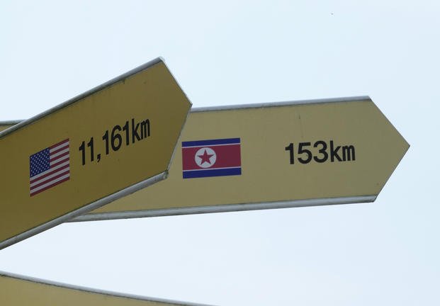 Destination signs to North Korea's capital Pyongyang and the United States are seen at the Imjingak Pavilion