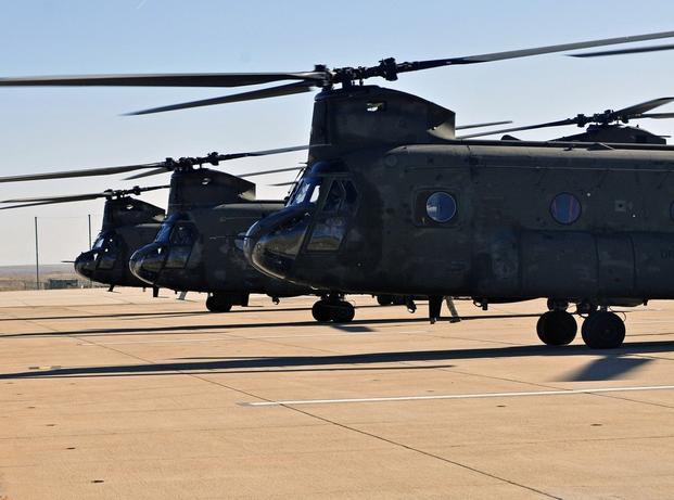 The 4th Combat Aviation Brigade, 4th Infantry Division receives its first CH-47 Chinook helicopters at Butts Army Airfield on Fort Carson, Colo., Jan. 22, 2013.