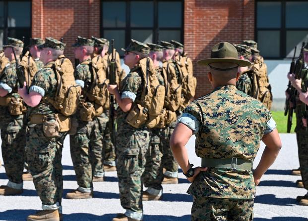 Recruits are marched to their next event by their drill instructor on Marine Corps Recruit Depot Parris Island, S.C., April. 12, 2023. 