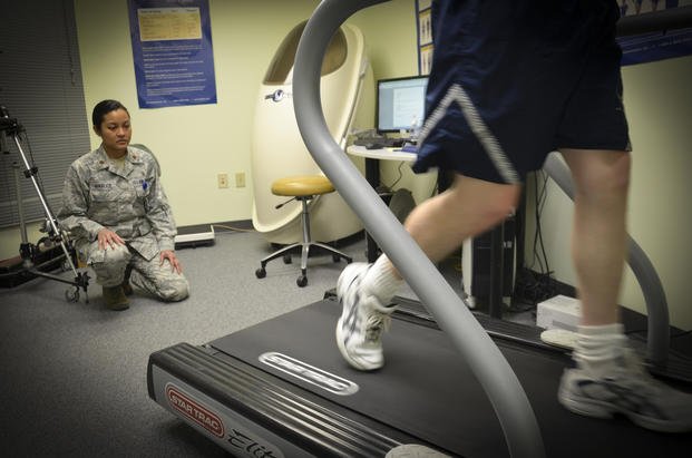 Maj. Lee Warlick, 628th Medical Operations Squadron Physical Therapy flight commander, observes an airman walk on a treadmill during a Gait Analysis Clinic appointment at Joint Base Charleston-Air Base, S.C.