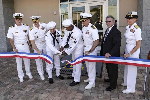 Ribbon-cutting for a littoral combat ship facility in 2015