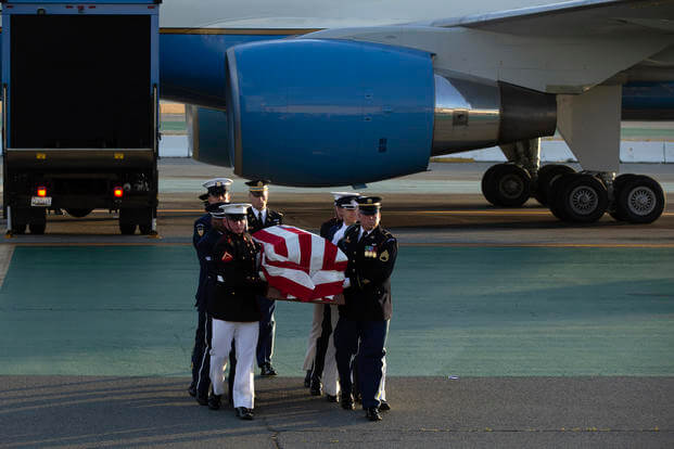 An Armed Forces color guard carries the casket containing the body of U.S. Sen. Dianne Feinstein.