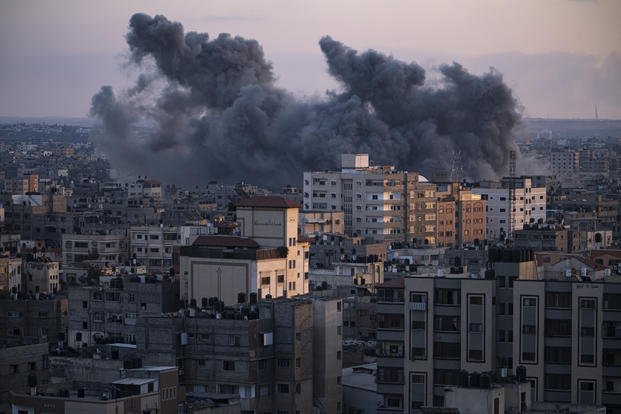 Smoke rises following an Israeli airstrike in Gaza City