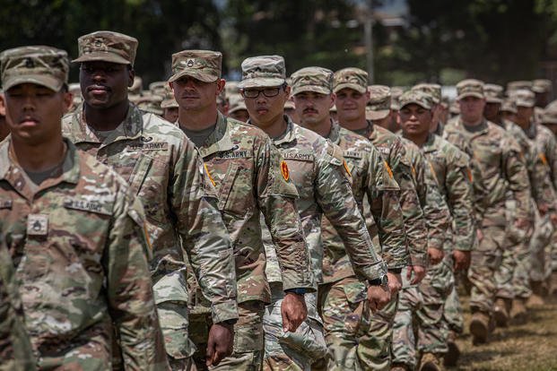 Army Soldiers Wrestle with Jungle Challenges in the Pacific