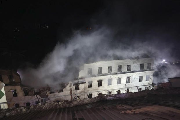 apartment building damaged in a Russian rocket attack is seen in Kharkiv, Ukraine