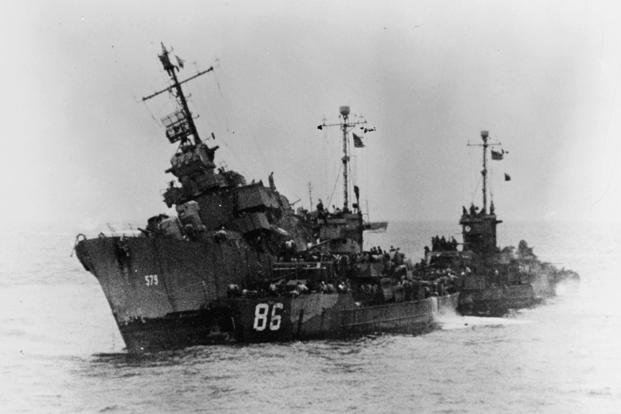 The U.S. Navy destroyer USS William D. Porter sinks after receiving severe underwater damage from a nearby explosion from a kamikaze suicide aircraft off Okinawa, Japan, on June 10, 1945. (U.S. Navy photo)