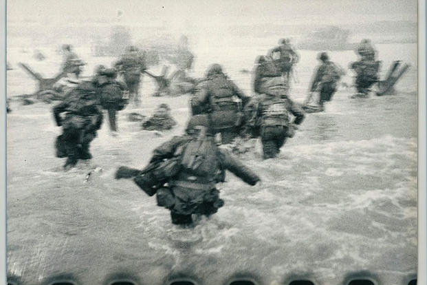  troops storming ashore on the morning of D-Day