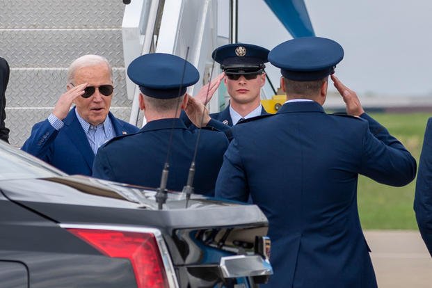 Biden salutes members of the 171st Air Refueling Wing Mission Support Group at the 171st Air Refueling Wing