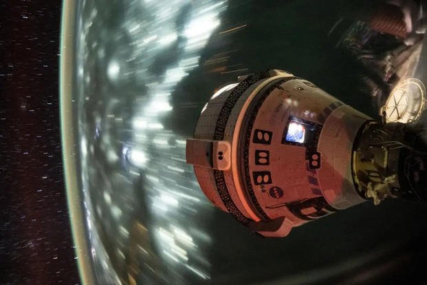 Boeing's Starliner spacecraft is pictured docked to the International Space Station’s Harmony module forward port.