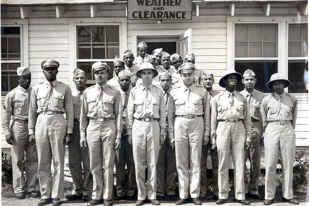 In this image circa 1944, Lt. Archie Williams (2nd from left in front row), who won the 400-meter gold medal at the 1936 Olympics in Berlin, was part of the Tuskegee Weather Detachment that served with both the 332nd Fighter Group and 477th Bombardment Group. 