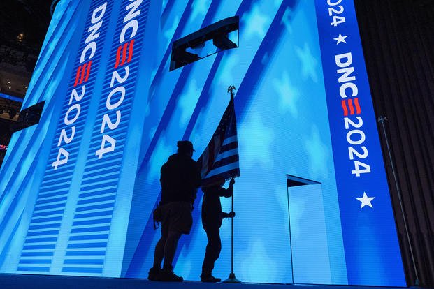 An American flag is placed on the stage as preparations are made before the Democratic National Convention in Chicago. 