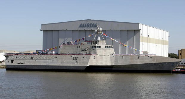  The Littoral Combat Ship Coronado sits alongside the Austal USA facilities on the Mobile River