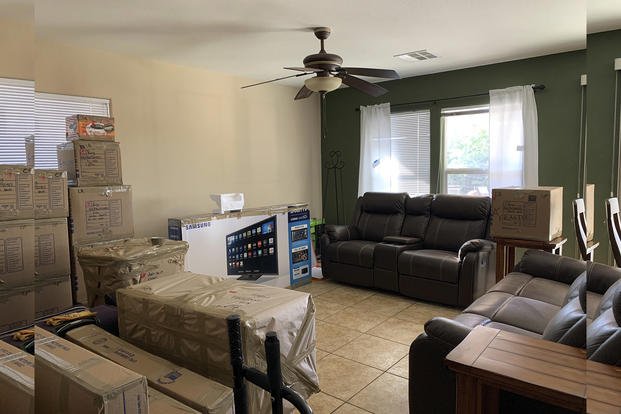 Moving boxes sit in the old home of a logistics flight commander in Las Vegas, April 28, 2020.