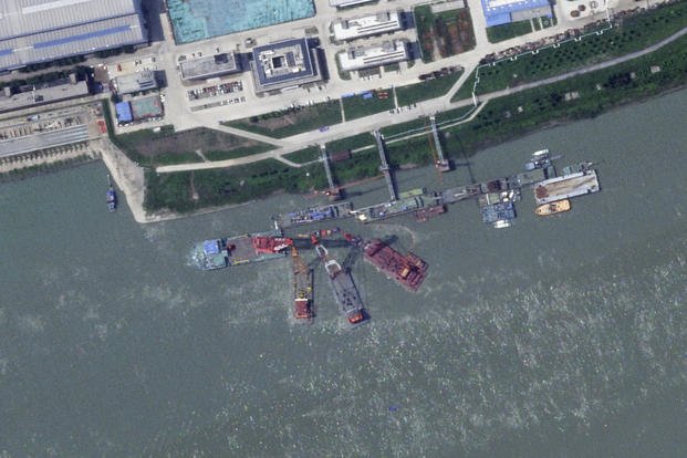 what appears to be a sunken Chinese submarine at a shipyard near Wuhan, China