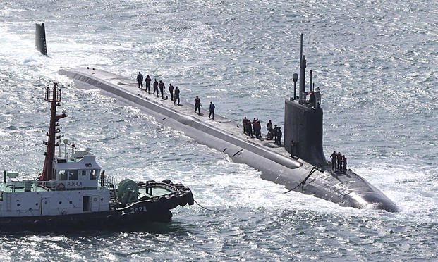 The USS Vermont, a nuclear-powered and fast-attack submarine, enters a naval base in Busan, South Korea