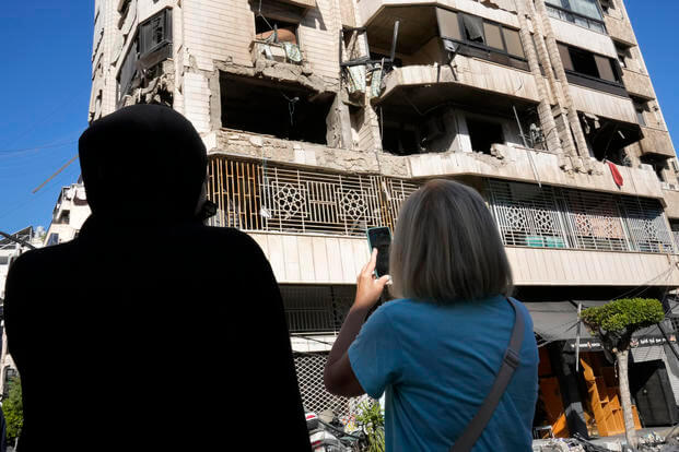 apartment in a multistory building hit by Israeli airstrike, in central Beirut