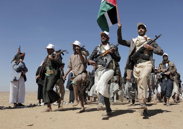 Houthi rebel fighters march during a rally of support for the Palestinians in the Gaza Strip