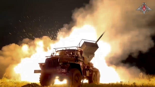 Russian Army "Grad" self-propelled 122 mm multiple rocket launcher fires rockets toward the Ukrainian position