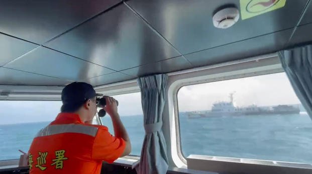  Taiwan Coast Guard monitors a China Coast Guard boat as it passes near the coast of Matsu islands