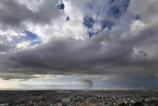 Smoke rises from buildings hit in Israeli airstrikes in Beirut, Lebanon.