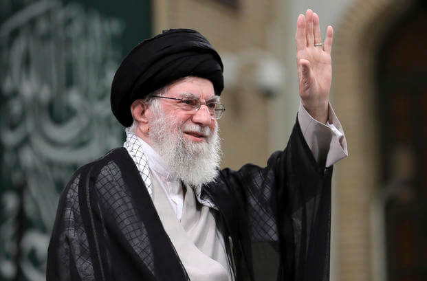 Iran's Supreme Leader Ayatollah Ali Khamenei waves to the crowd.