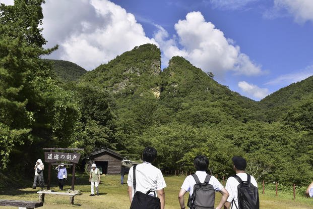 People visit remains of a Sado gold mine in Japan. 