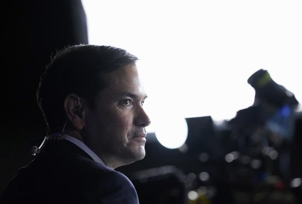 Sen. Marco Rubio, R-Fla., pauses while talking with reporters