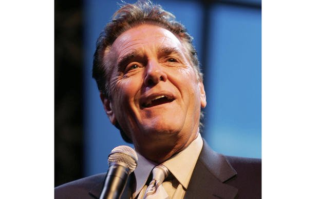 Chuck Woolery hosts a special premiere of the '$250,000 Game Show Spectacular' at the Las Vegas Hilton Saturday, Oct. 13, 2007, in Las Vegas. (Ronda Churchill/Las Vegas Review-Journal via AP, File)