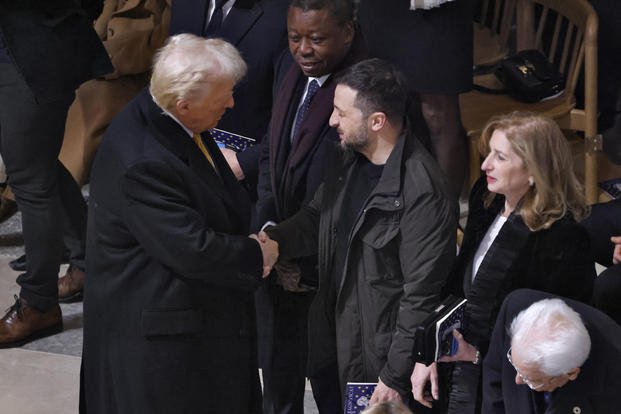 President-elect Donald Trump shakes hands with Ukraine's President Volodymyr Zelenskyy