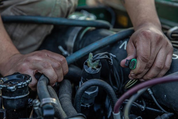 U.S. Marine Cpl. Daniel Saucedo, an automotive maintenance technician with 1st Maintenance Battalion, 1st Marine Logistics Group, goes through maintenance troubleshooting on a high mobility multipurpose wheeled vehicle on Camp Pendleton, Calif.