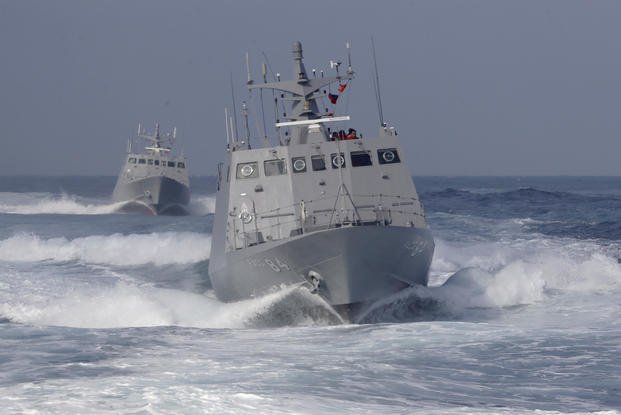 Two Kuang Hua VI-class missile boats are seen during a simulated attack drill off Kaohsiung City