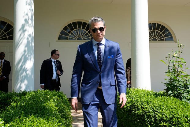 Defense Secretary Pete Hegseth attends a National Day of Prayer event with President Donald Trump in the Rose Garden at the White House in Washington, D.C.