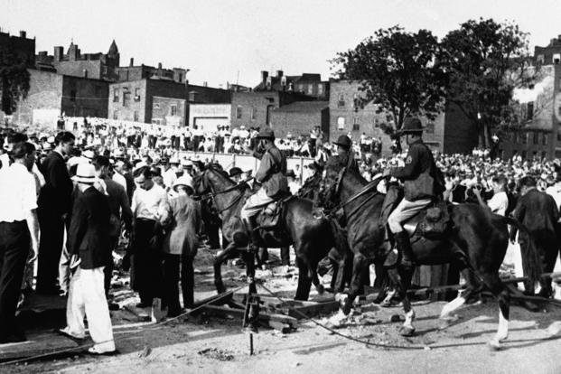 In Washington, D.C., a cavalry led by Major George S. Patton routed an ‘army’ of his fellow World War I veterans, their wives and children, who protested in 1932 to beseech Congress for promised bonuses. 