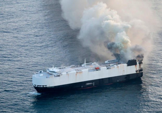  smoke rises from cargo vessel Morning Midas approximately 300 miles south of Adak, Alaska