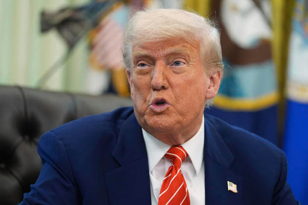 President Donald Trump speaks during a news conference with Elon Musk in the Oval Office of the White House